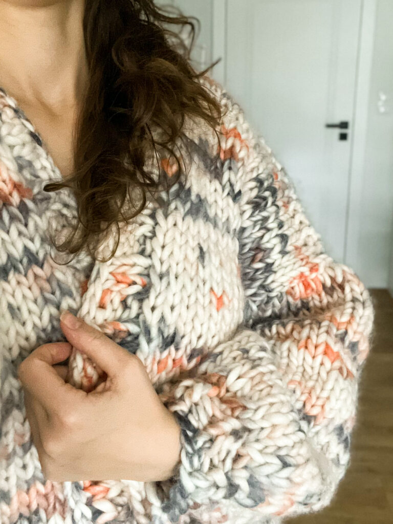 oversized woolen cardigan made from white, green and orange  yarn